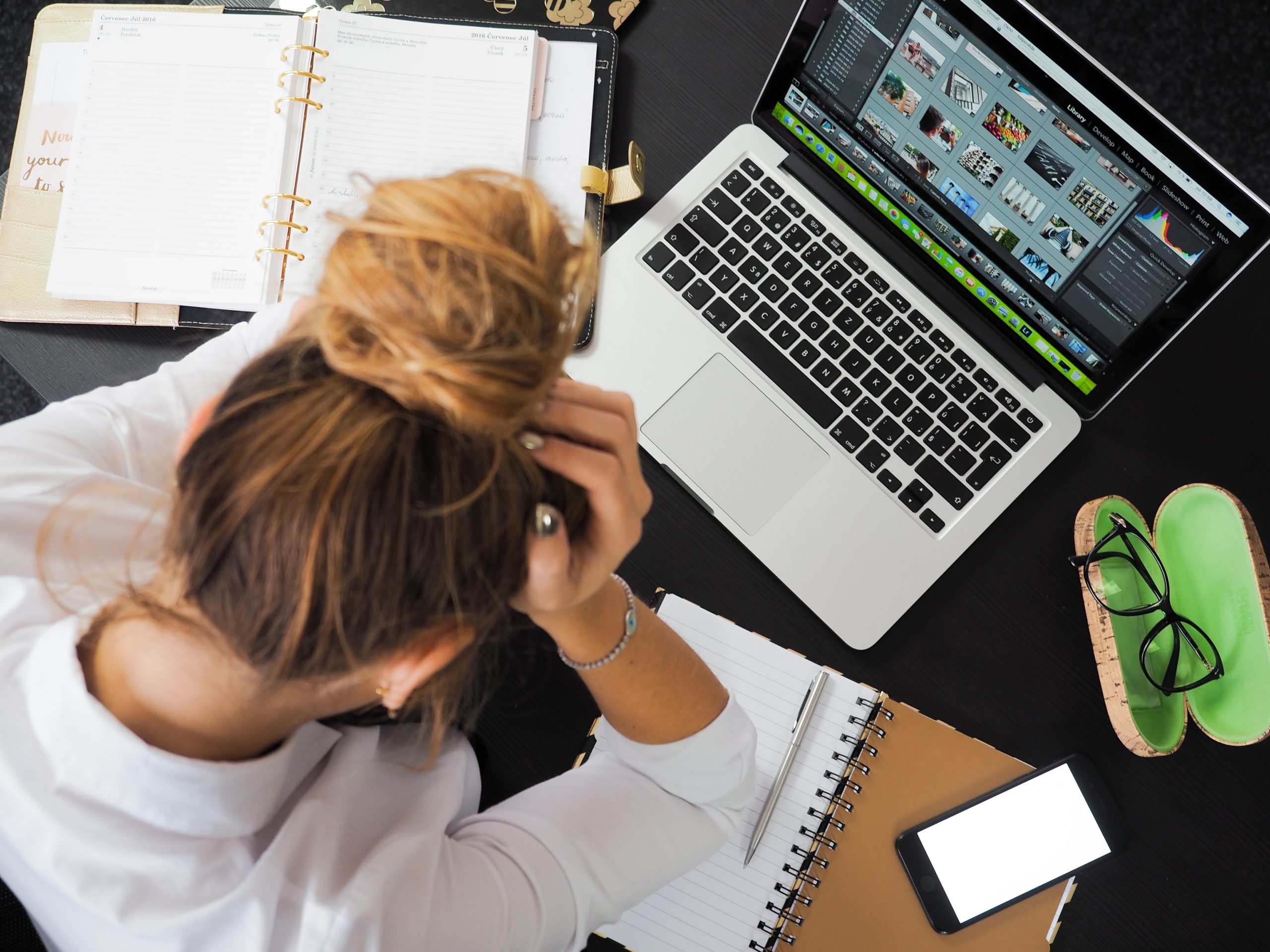 women stressed at desk