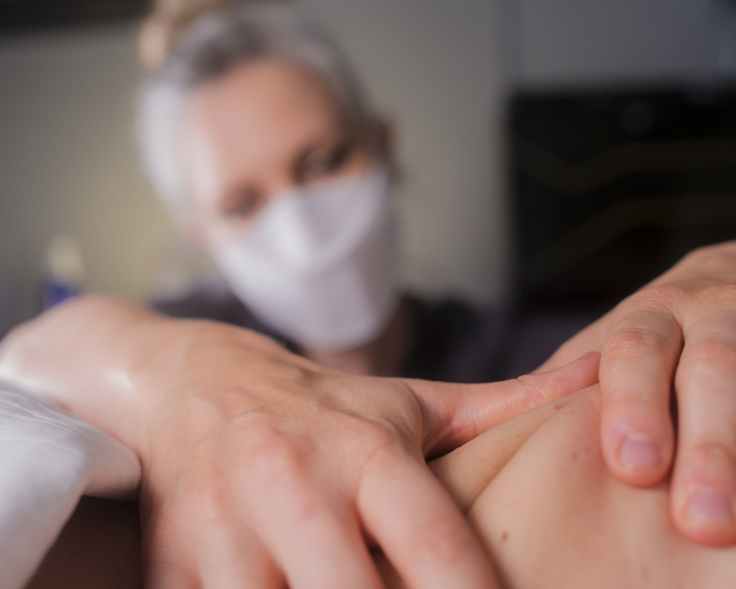 Deep Tissue Massage - Hands massaging back
