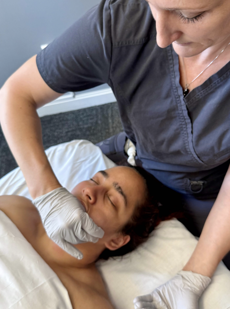 tmd intraoral massage with a gloved hand